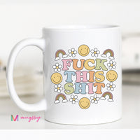 White mug with colorful text and graphics on a white background