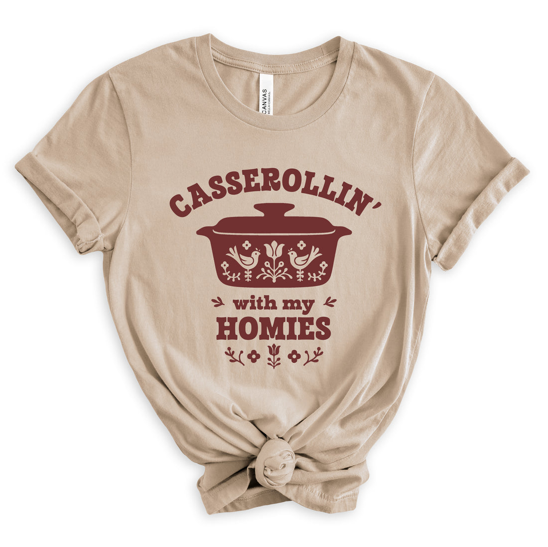 Beige t-shirt with red graphic and text &